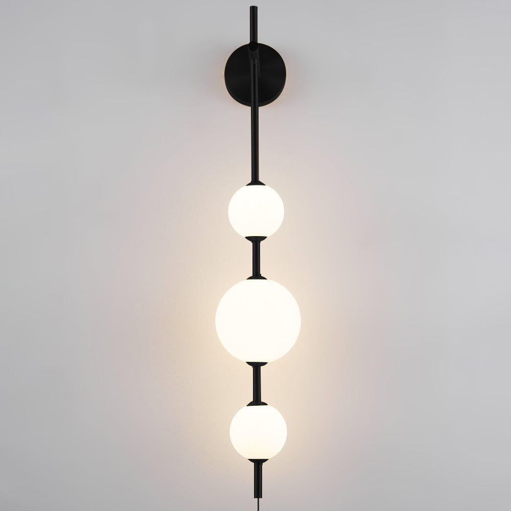 Vertical Globe Plug In Wall Lamp
